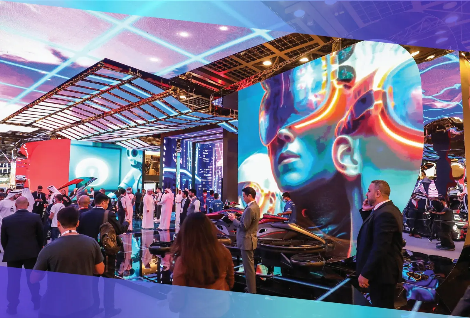 Visitors gathered around a large immersive LED display at a Dubai tech showcase
